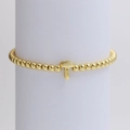 18K gold plated beaded stretch bracelet featuring a polished alphabet letter T charm - Gold T