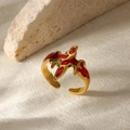 Detailed view of 18K gold plated ring featuring red heart wings and adjustable open band - Gold Red Enamel Bat Style (G11206940) / Gold