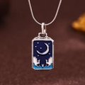 Macro shot of rectangular tarot pendant with blue enamel star and moon on silver chain - Silver (X6052SY)