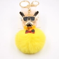Dettaglio di un portachiavi creativo bulldog francese con grande pompon di pelliccia giallo - Giallo