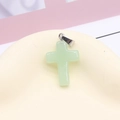 Cross pendant crafted from light green natural stone with a silver-tone metal bail - Light Green