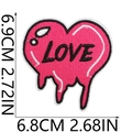 Macro detail of magenta heart-shaped love embroidery patch with size dimensions - No. 24 (Drip Rose Red Heart Love)