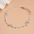 Macro detail of a double-layer bow necklace with zircon beads on a warm peach background - Green Butterfly Style (Two-piece Set)