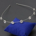 Elegant silver hairband with six sparkling rhinestone flower clusters for bridal hairstyles - Rhinestone Flower Headband (9123) / Silver