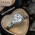 Sparkling four-prong round zircon engagement ring in an elegant vintage heart jewelry box - US 9 / White Gold