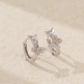 Elegant s925 silver hoop earrings featuring butterfly charms with sparkling crystals - White Gold