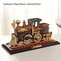 Vintage steam train music box model in bronze finish with detailed railway base ornament - Bronze Train Engine Music Box