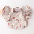 Waterproof baby bib with wings design featuring rainbows and clouds on a beige background - Wings - Full Rainbow Print / One Size