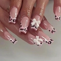 Close-up of long square press-on nails with pink leopard patterns and 3D white bows - No Accessories Style / X-0342 Pink Leopard Bow