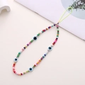 Colorful beaded phone strap featuring blue Evil Eye beads on a white background - K1146 Glass Bead + Eye Style