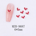 Detail of red heart nail charm with silver border and 6x5mm size on pink manicure - Heart Style (9687)