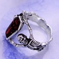 Macro detail of Gothic skull ring featuring a red coffin inlay and vintage silver finish - US 7 / Red Stone Skull