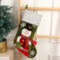 Detailed view of green Christmas stocking with 3D snowman plush on a wooden ladder decor - Green Snowman Faux Leather Hand Stocking