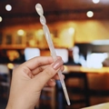 Detail of twisted acetate hair stick in pearl white marble texture held by hand - 10# Pearl White Marble