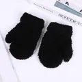 Close-up of thick black coral fleece mittens featuring elastic ribbed cuffs for children - S / Black