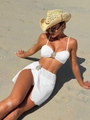 Detailed close-up of white crochet beach bikini with metal teardrop rhinestone accents - S / White