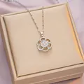 Silver flower pendant necklace with large clear gemstone and sparkling crystal petals - 6046 Hollow Flower / Silver
