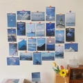 Cartoline di paesaggi nordici blu con parole ispiratrici per decorazioni murali - Mondo Azzurro