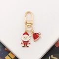 Close-up of Santa and Christmas hat metal keychain with glittery rhinestones - Santa Claus-6 (with Rhinestone Hat)