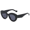 Occhiali da sole ovali neri oversize con montatura spessa e lenti scure - Nero