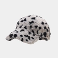Detail of soft faux fur baseball cap featuring a stylish black and white leopard print design - Grey and Black Leopard Spots