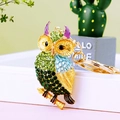 Sparkling blue and green crystal owl keychain with a polished gold finish and ring - A430 Owl Q Green