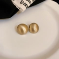 Minimalist matte gold round stud earrings with textured brushed finish on ceramic tray - Matte Gold Brushed Ball (925 Sterling Silver Earring Post)