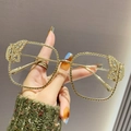 Oversized champagne gold metal sunglasses with rhinestone butterfly detail on frame - Anti blue light