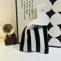 Knit knot bag with classic black and white wide stripes in a modern minimalist style - Black and Cream Striped