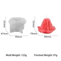 Volcano shaped silicone candle mold with finished pink wax model on white background - Volcano Candle Silicone Mold