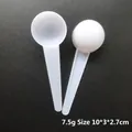 Misurino in plastica bianca da 7,5g per latte in polvere con vista fronte e retro - 7,5g (10*3*2,7cm) / Bianco