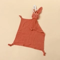 Detail of terracotta cotton gauze baby security blanket with embroidered rabbit face - 30*30 cm / Brick Red