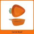 Carrot shaped ceramic hamster feeding bowl with orange glaze and green leaf handle - Carrot Bowl
