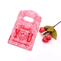Small red plastic gift bag with handle and white Thank You print for jewelry - No. 52 (Red Smiley)