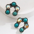 Vintage boho earrings with antique silver finish and turquoise stones on white background - C-Shape - AB Turquoise Crystal