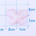 Pink translucent glitter resin bow charm for DIY jewelry and hair accessories - Pink