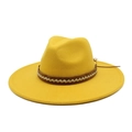 Detail of a bright yellow fedora hat showing a brown leather band and woven rope accents - Yellow