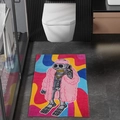 Close-up of rectangular plush bath mat featuring a skull in pink fur on psychedelic background - Christmas Style 11