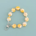 Cute yellow cat paw bead keychain with clear acrylic beads and silver lobster clasp - Yellow and White Paw Style (B345-3)