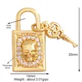 Miniature gold micro-pave skull lock and key pendant with white crystal borders - Relief Skull Lock / Gold