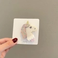 Handheld photo of a white felt unicorn hair clip with colorful sequins for girls - White Sequin Unicorn