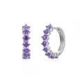 Detail of silver hoop earrings featuring micro-paved purple cubic zirconia stones - Silver / Purple Zirconia