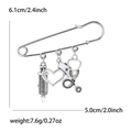 Silver alloy medical brooch pin featuring syringe heart and stethoscope charms - Medical Theme