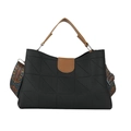 Minimalist black handbag with brown handle and patterned strap featuring geometric texture - Black and Brown