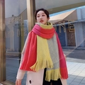 Pink yellow and grey color-blocked knit scarf with fringes on a female model - Four Color Colorful