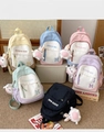 Detailed display of colorful nylon backpacks with plush bunny charms for girls - Single Bag / Black