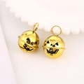 Golden Halloween pumpkin bells with jack-o-lantern face cutouts and metal loops - 24mm / Bright Gold