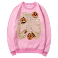 Pink fleece hoodie with Halloween pumpkin and skeleton print in a centered flat lay view - S / Tops / Pink (Pumpkin Skeleton Ribs)