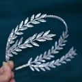 Macro shot of silver bridal leaf tiara featuring intricate crystal leaf detailing - DZ115 / Silver