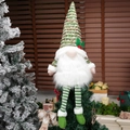 Nordic Christmas gnome with green and red striped hat on a tree top decoration - Green Tree Topper